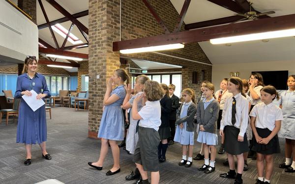 School choir performing for Warwick Court, Daventry customers 9