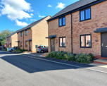 Photograph of three new semi-detached homes at Hermitage Drive