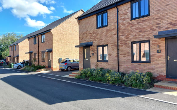 Photograph of three new semi-detached homes at Hermitage Drive